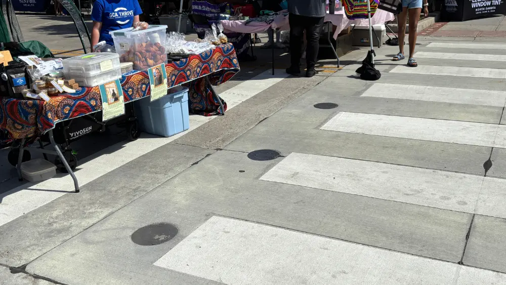 Image of empty bollard sleeves at the Juneteenth celebration