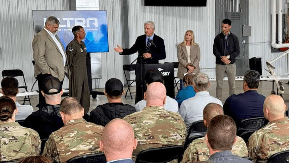 Image of Senator John Hoeven speaking to an audience at GrandSKY