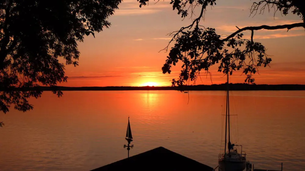 a body of water at dusk