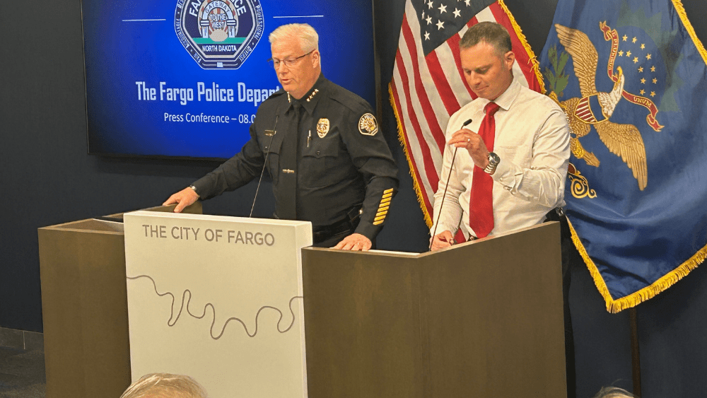 Fargo Police Chief David Zibolski (left) and Captain Bill Ahlfeldt (right) speak at an August 5th 2025 news conference about an arrest made in connection to two deadly weekend shootings (Photo: Austin Erickson)