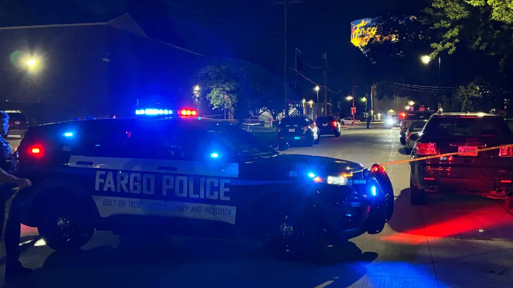 Image of police blocking off the 900 block of 6th Avenue North
