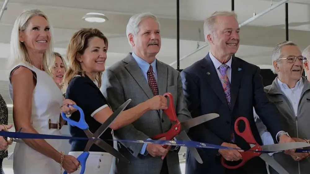 Image of ribbon cutting ceremony at Hector
