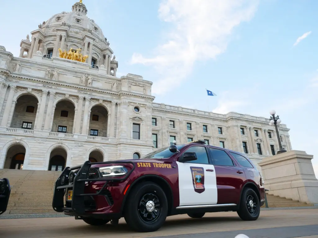 Minnesota State Patrol squad car in front of the Minnesota capitol