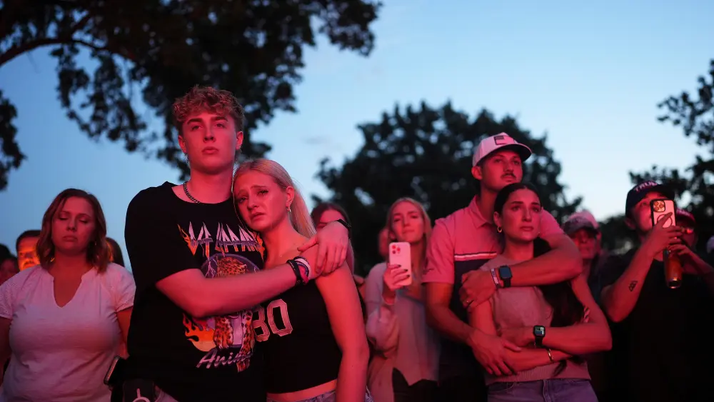 Image of people at a Charlie Kirk vigil