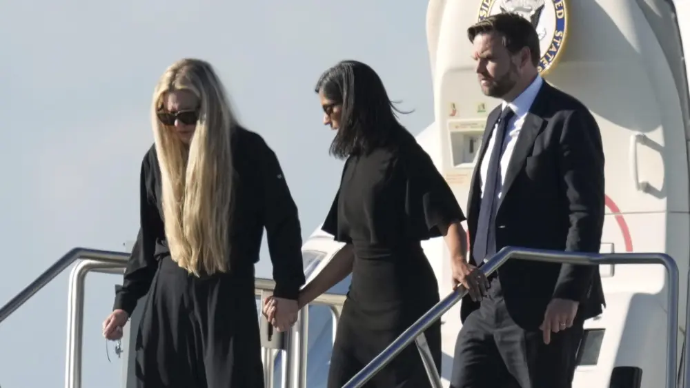 Two women and a man