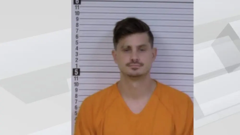 man in an orange shirt
