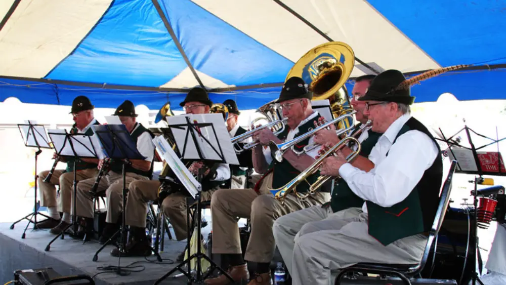 Image of band playing on a stage at Hankinson's Oktoberfest