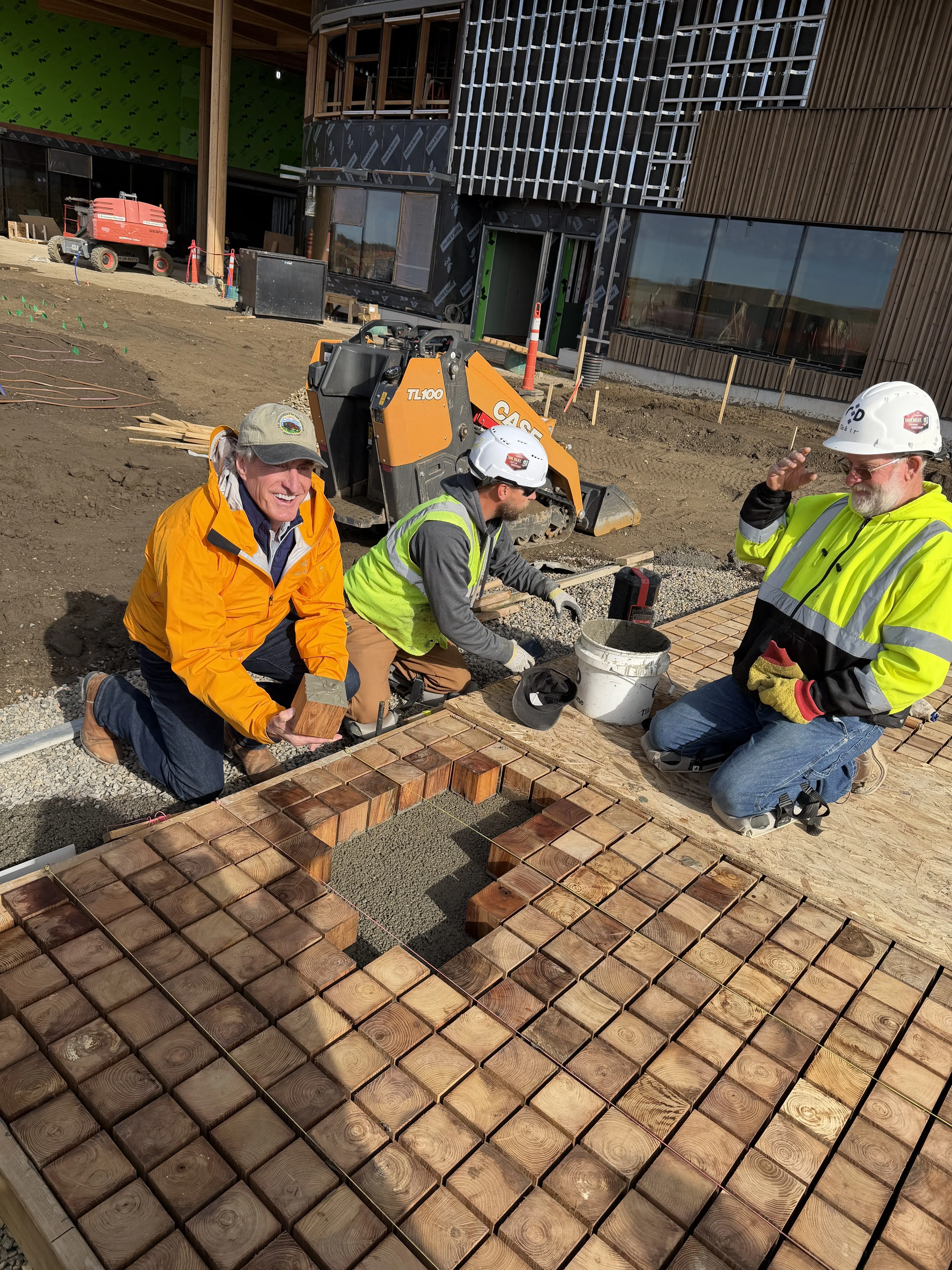 Image of Burgum with work crews
