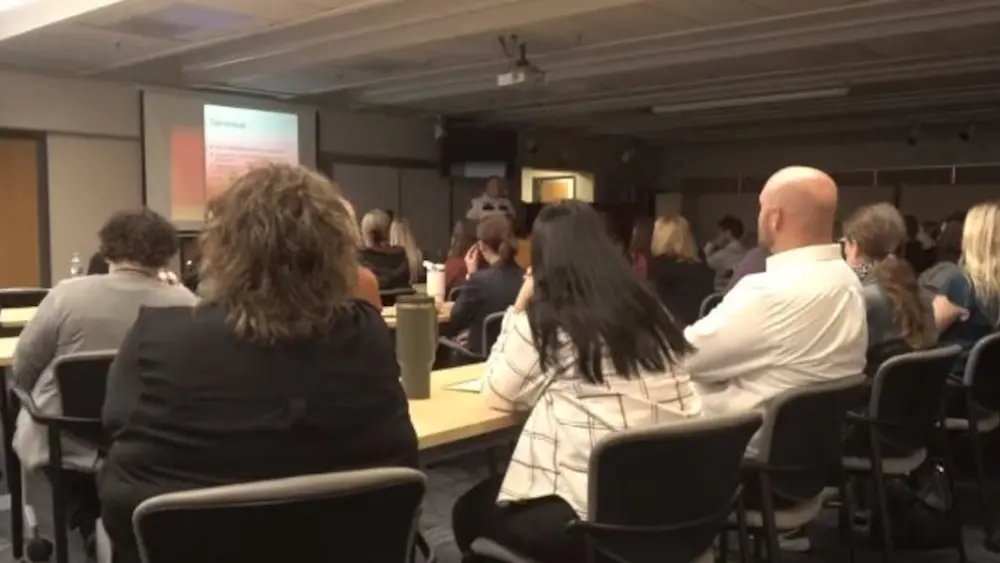 Image of people gathered for a Cass County training session