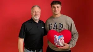 2 guys posing for a photo