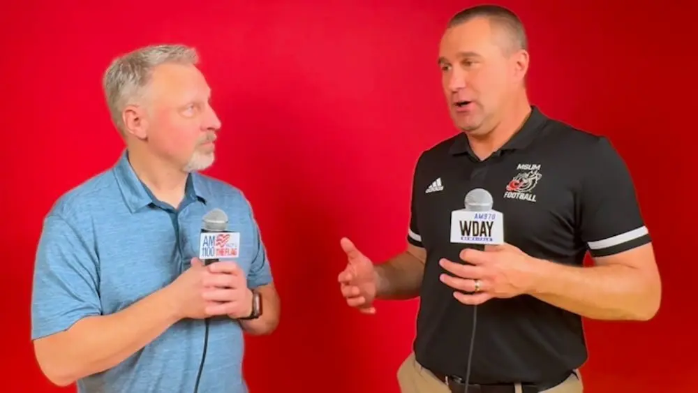 2 guys having a conversation