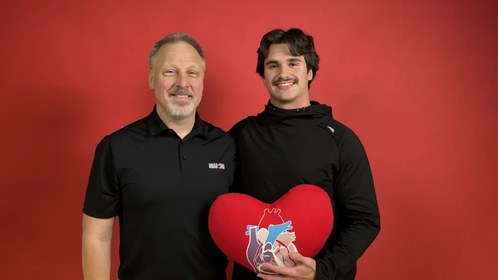 2 guys posing for a photo