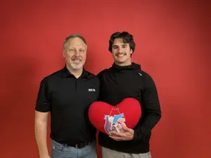 2 guys posing for a photo