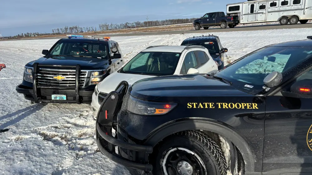 squad cars surround vehicle