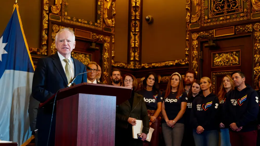 man addresses with people watching