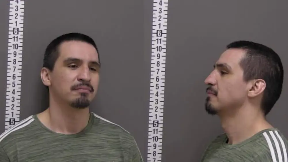 a man in a mugshot