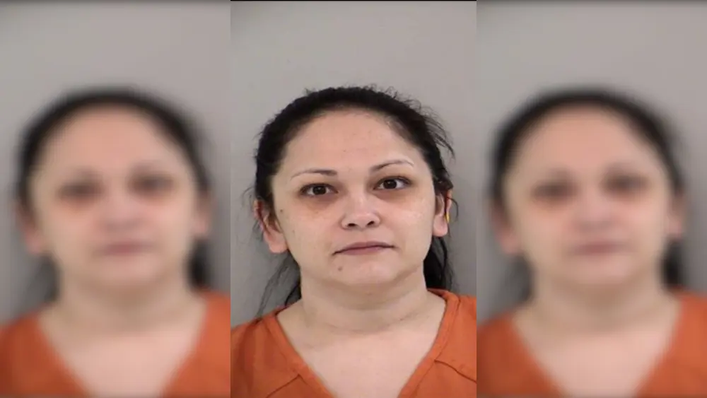 A woman in an orange shirt