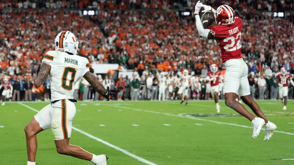 Indiana University defensive back Jamari Sharpe intercepting a pass