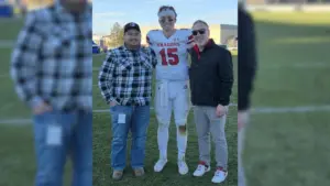 3 guys posing for a photo