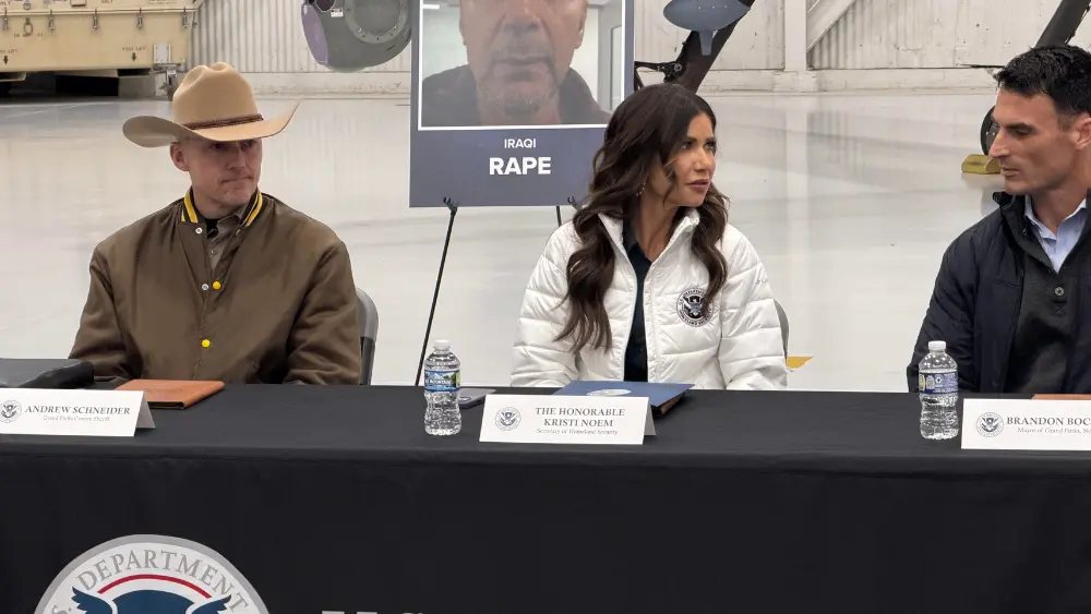 Grand Forks County Sheriff Andy Schneider, Homeland Security Secretary Kristi Noem and Grand Forks Mayor Brandon Bochenski
