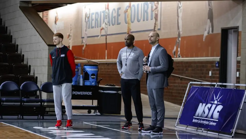 3 guys having a conversation