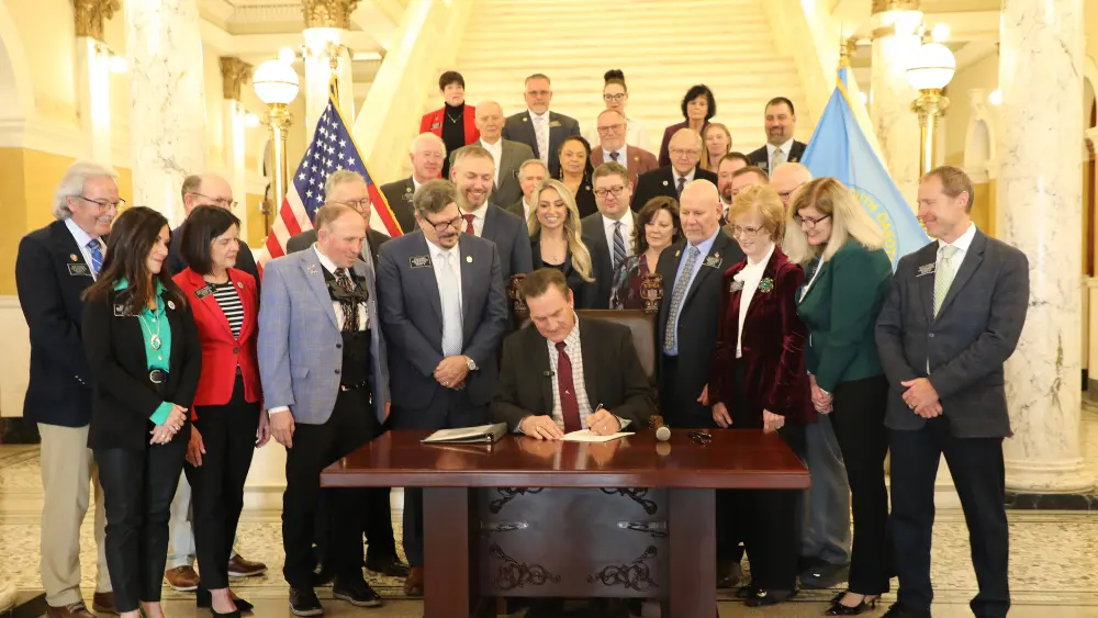 a man signing a document