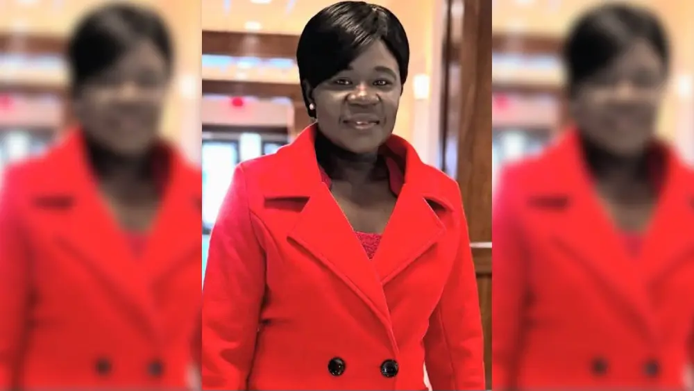 a woman in a red jacket