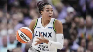 Napheesa Collier dribbling a basketball