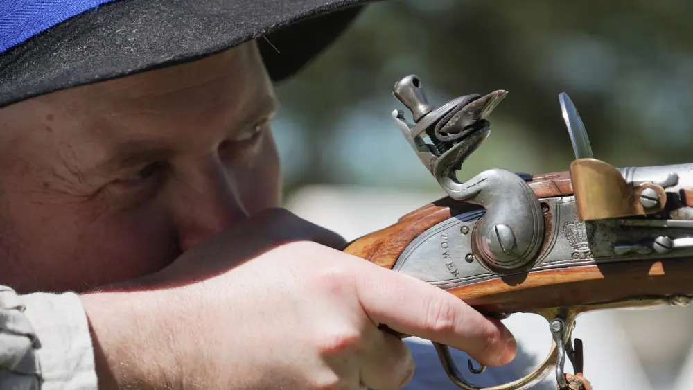 Man shooting a musket