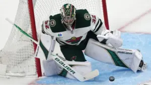 Minnesota Wild goalie Flip Gustavsson saving a shot