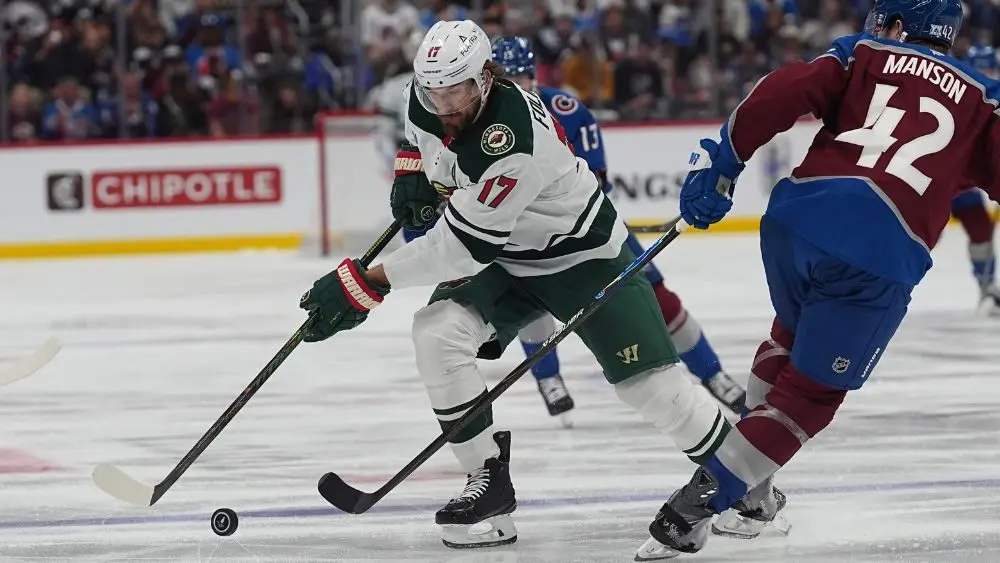 Minnesota Wild left wing Marcus Foligno skating with the puck