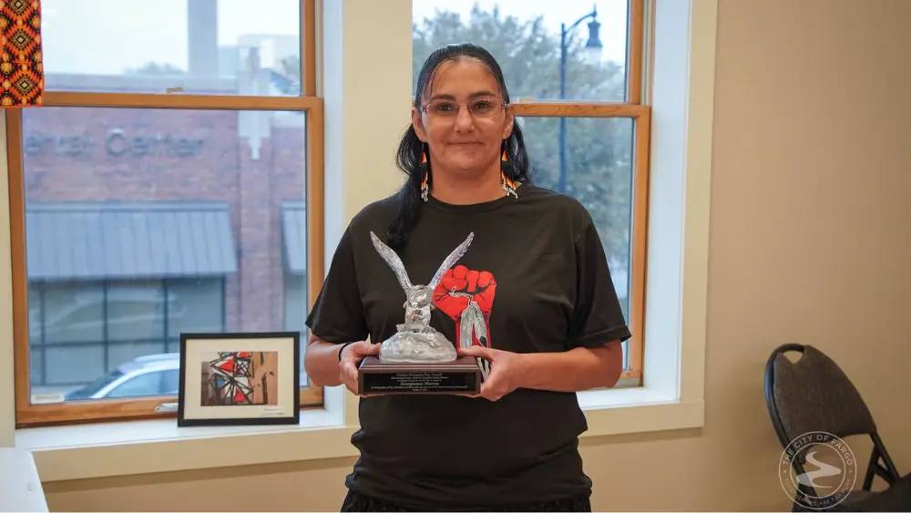 a woman with a trophy