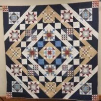 2023-opp-quilt-on-rack-e1685714807873
