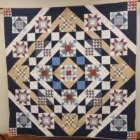 2023-opp-quilt-on-rack-e1697824457763