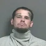 Vincennes Man Arrested for Murder After Liquor Store Shooting