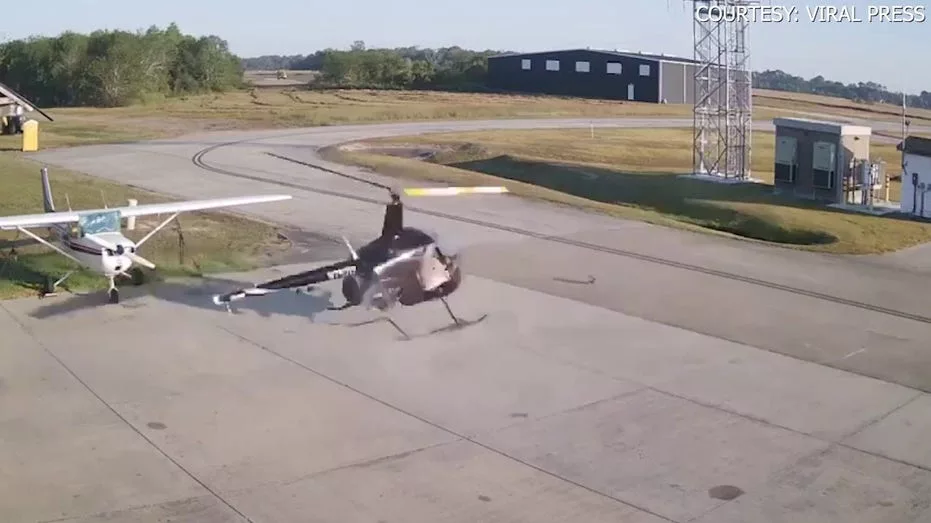 helicopter-spins-out-of-control-at-texas-airport-hits-parked-plane400490