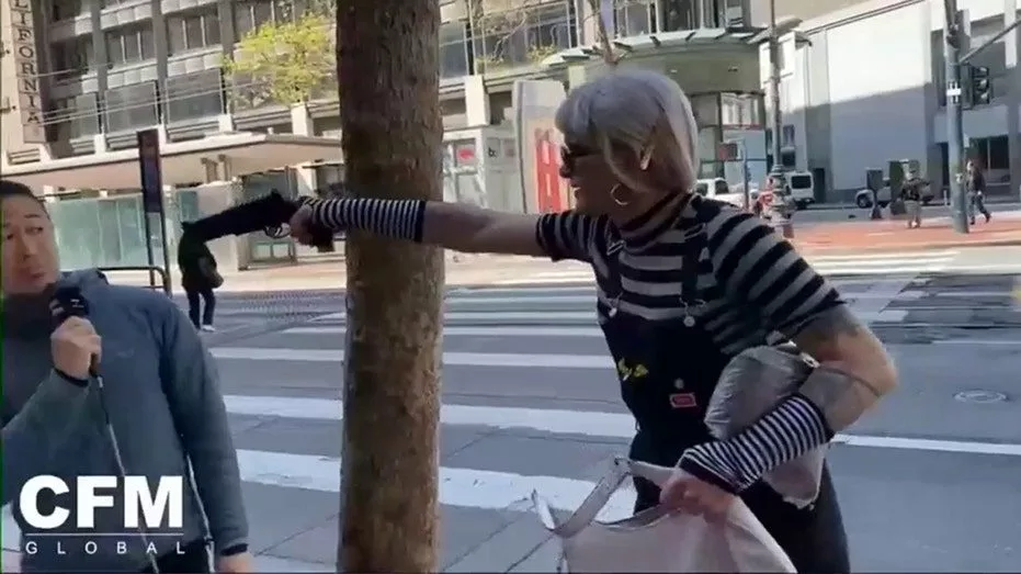 transgender-woman-pulls-gun-on-san-francisco-street-preacher-3146112