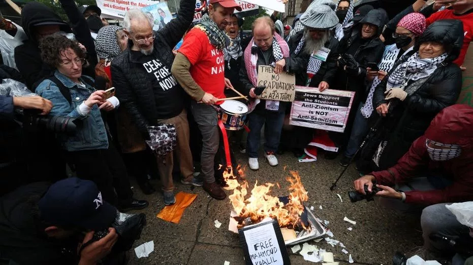 demonstrators-burn-diplomas-as-columbia-university348139