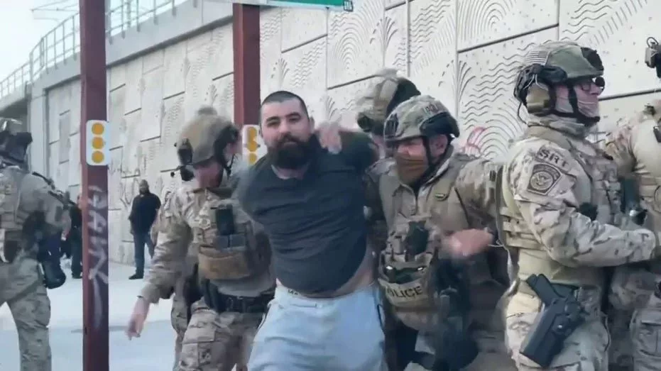police-arrest-suspect-accused-of-assaulting-officers-2828262