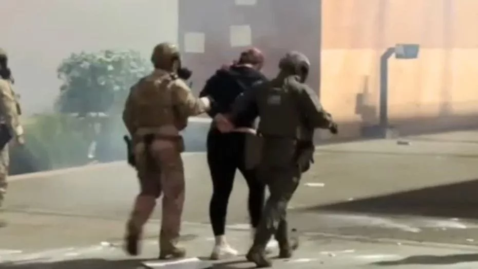 a-woman-is-arrested615776