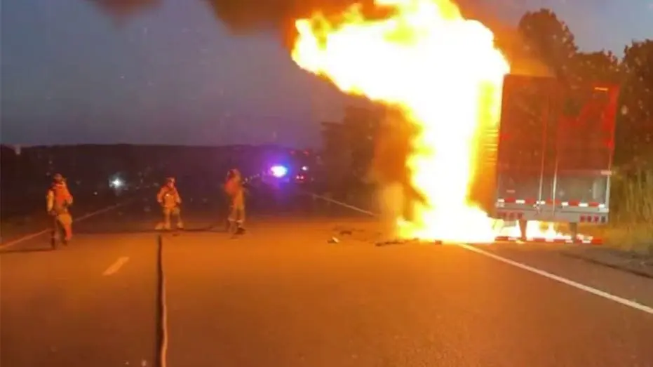firefighters-extinguishing-truck-fire791904