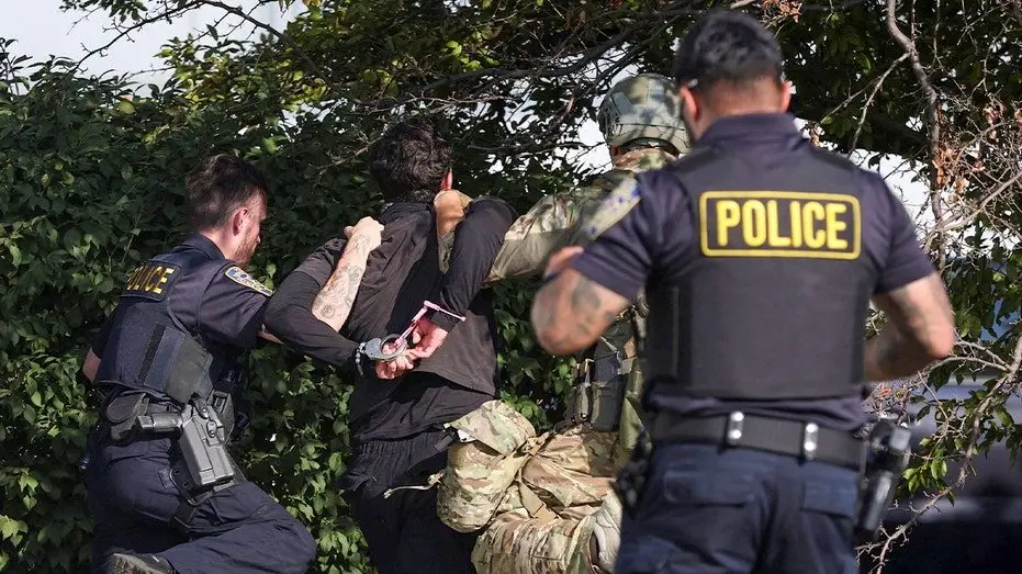 ice-protest-arrest-broadview-oct-3651726