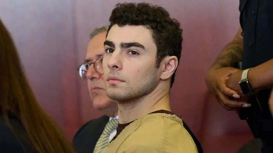 luigi-mangione-in-court-terror-charge-drops-048935333