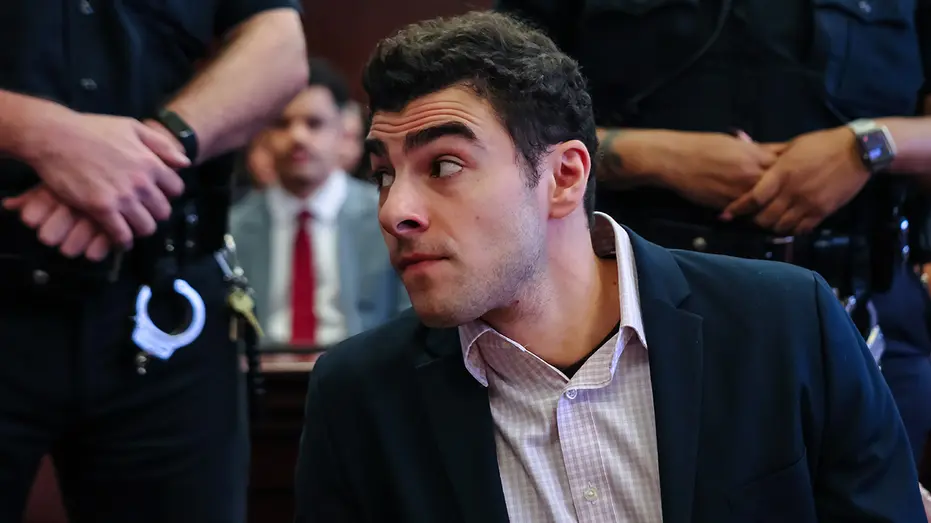 Cop describes recognizing Luigi Mangione when he pulled down mask at McDonald’s