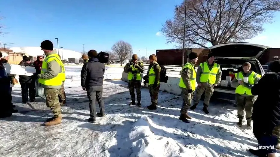 national-guard-in-minnesota-hand-out-coffee-donuts-to-anti-ice-protesters-2708895