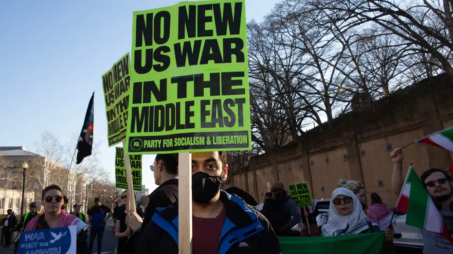 20260228_party-for-socialism-and-liberation-sign-at-pro-regime-protest-2129990