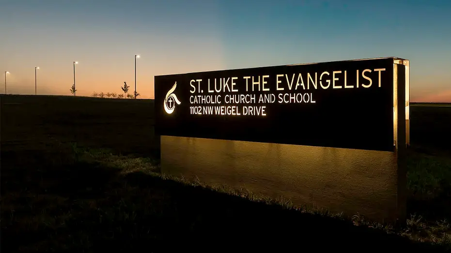 st-luke-school-sign-car-hits-students388676