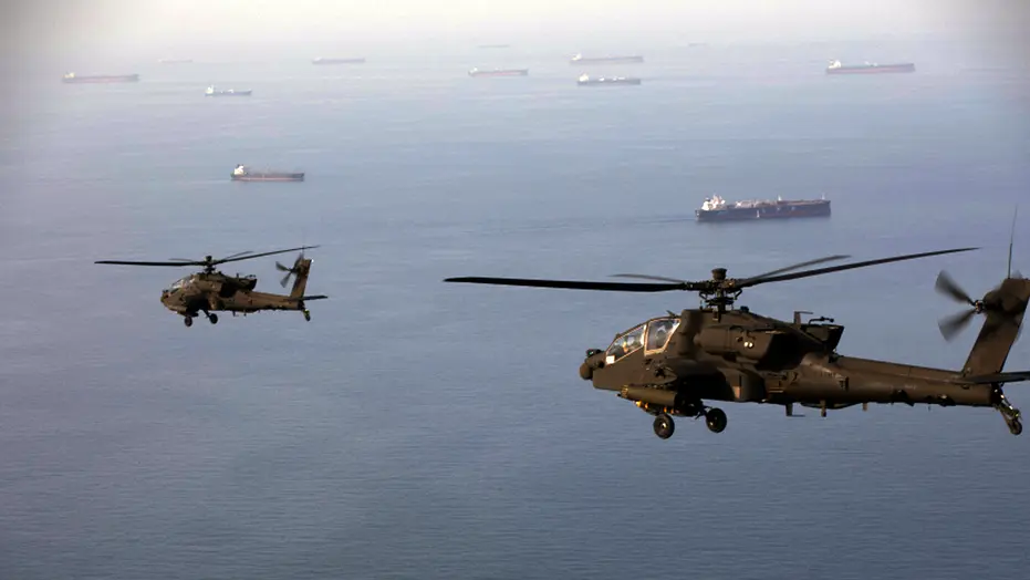 Distress call captures tanker under fire as Iran shuts Strait of Hormuz and more top headlines