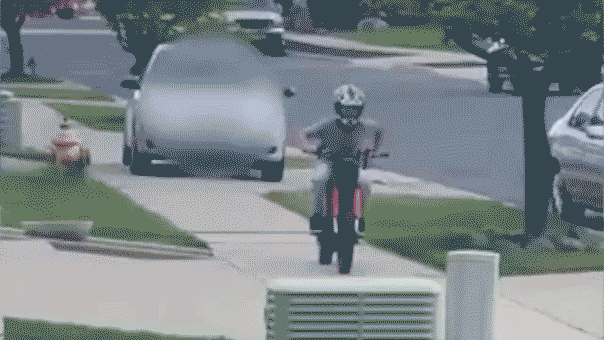 car-chasing-boy-sidewalk568991