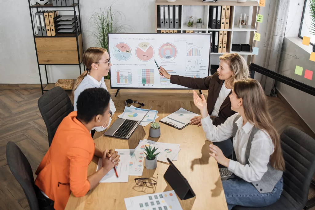 group-of-competent-female-financiers-having-working-meeting-at-office